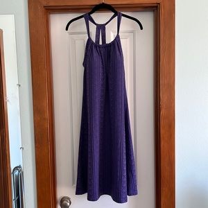 PrAna dress with built in bra, very contained. Hugs the body. No pockets.